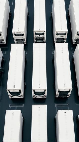 Fleet of trucks in freight yard wallpaper